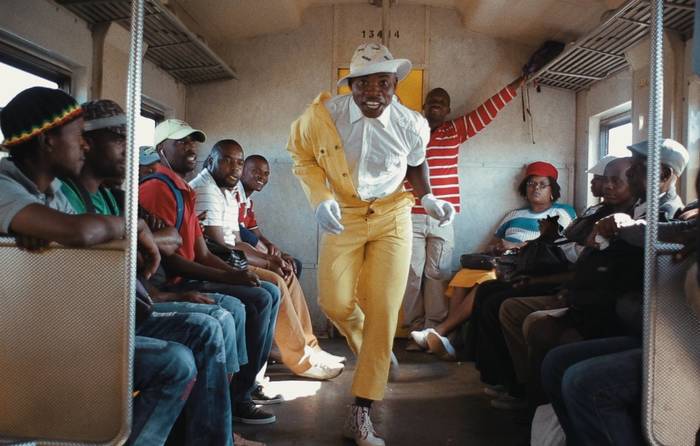 yellow jumpsuit dancer